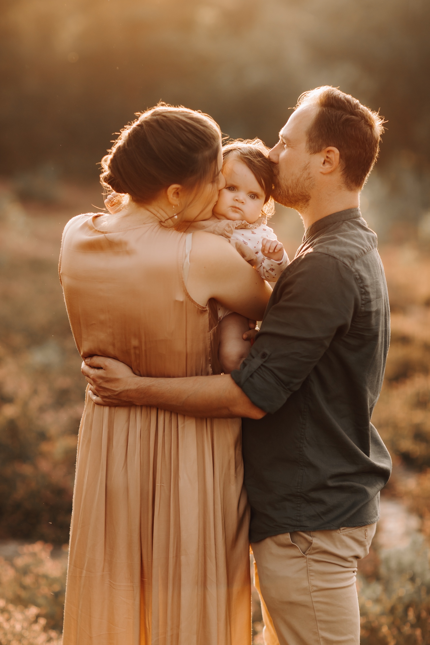 ouders met dochter tijdens fotoshoot in de teut te zonhoven