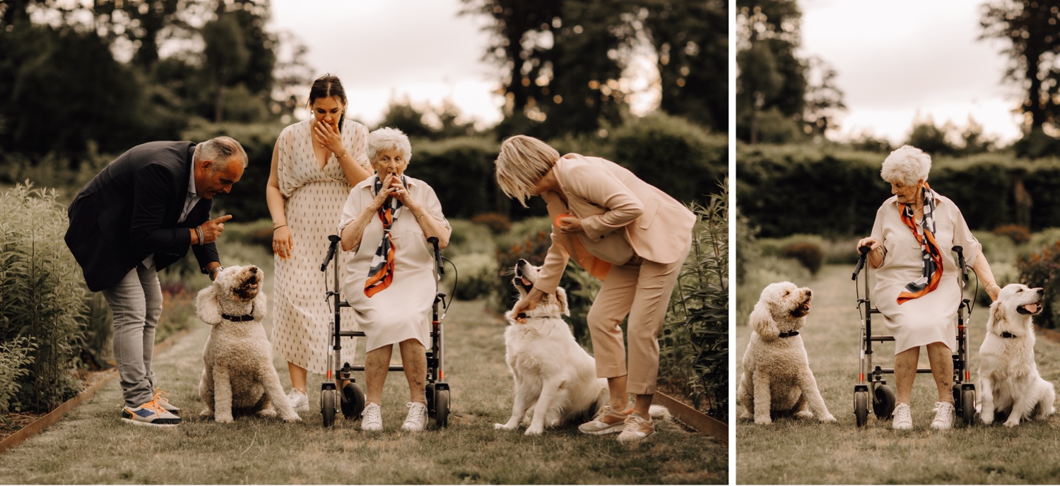 grootmoeder krijgt schrik tijdens het poseren met de hondjes in Alden Biesen
