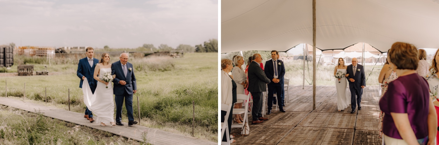 Landelijk huwelijk bij vierkantshoeve Bar Silo - bruid wandelt met haar grootvader en broer richting ceremonie bij Bar Silo